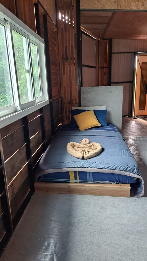 Single bed by a window